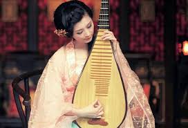 A performer playing the traditional Chinese instrument called a Pipa