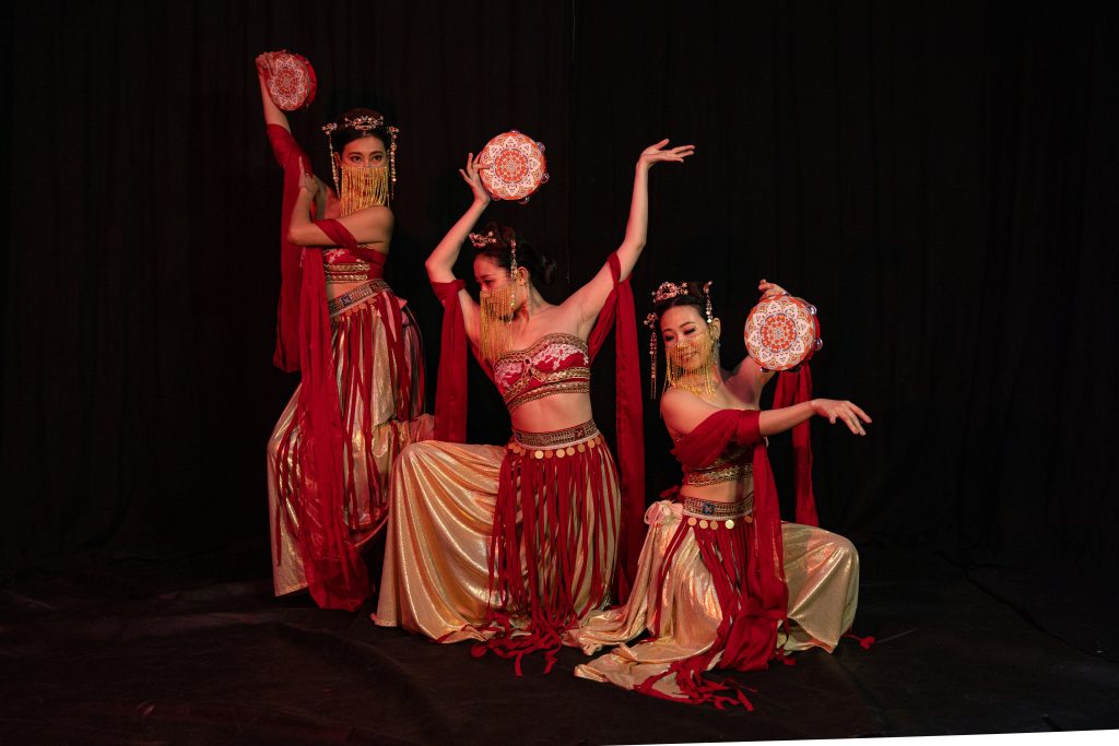Chinese Tambourine dance in traditional costumes
